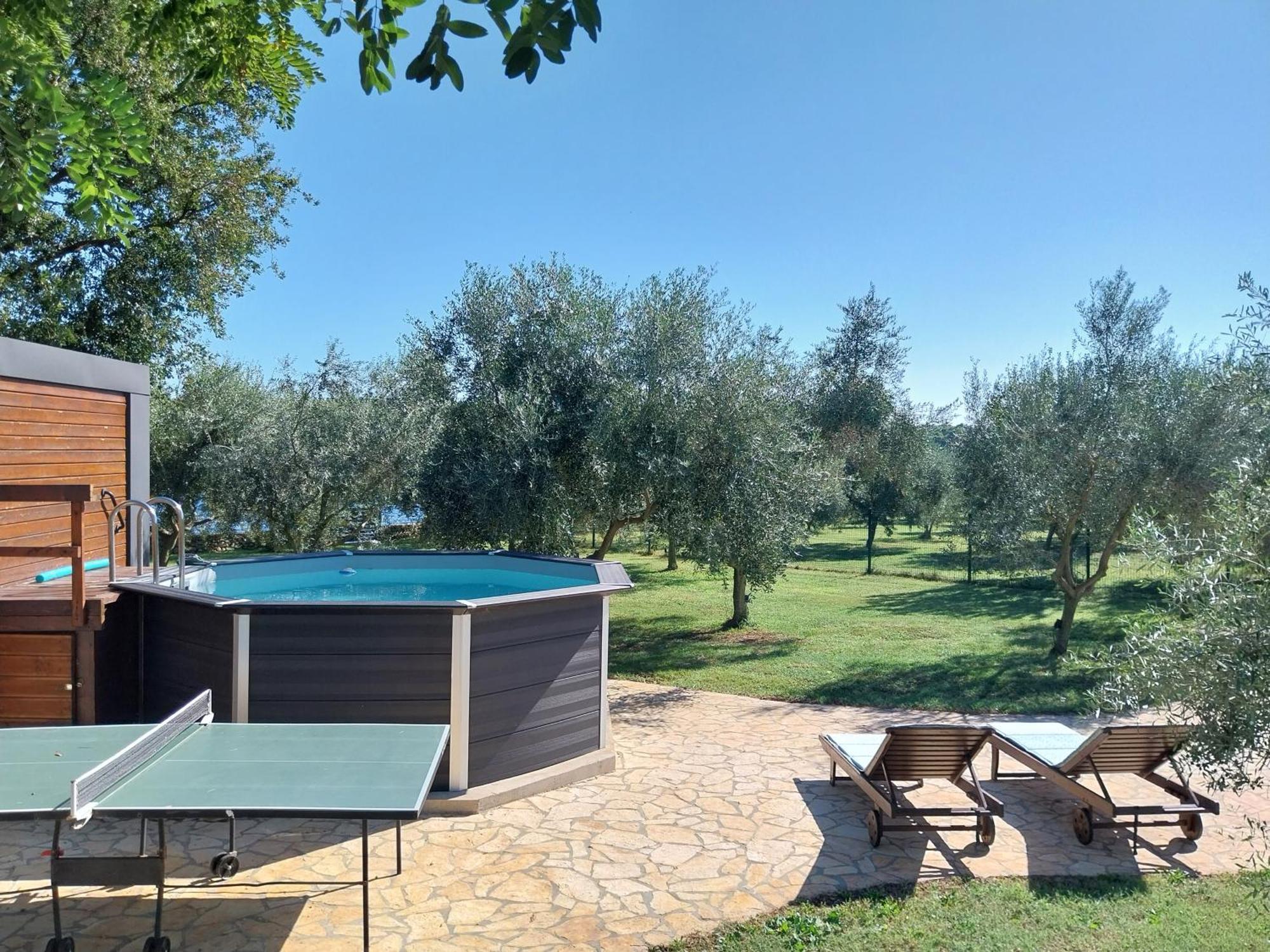 Beach House Ive: Coastal Retreat with Jacuzzi, Pool and Olive Grove Pomer Exterior photo